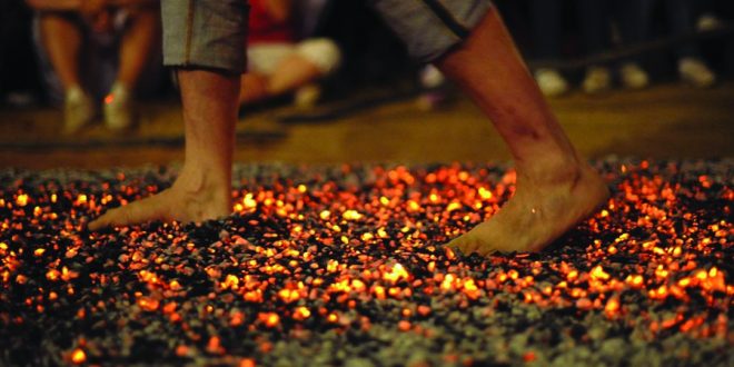 Firewalking - Walking on fire in order to evolve